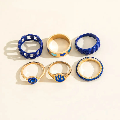 Elegant Blue Crystal Heart Knuckle Ring Set: Enamel Geometric Chain Shape Rings for Women - Unique Trendy Fashion Jewelry Collection